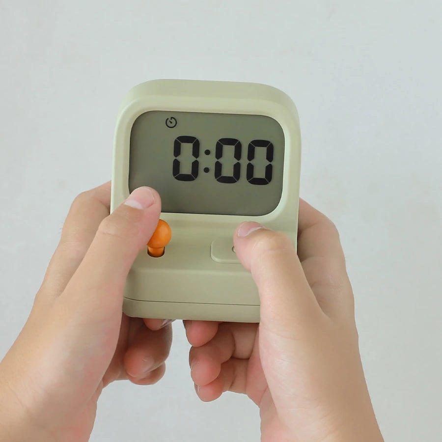 a retro arcade machine alarm clock