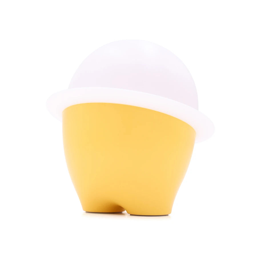 the back of a yellow and white night light