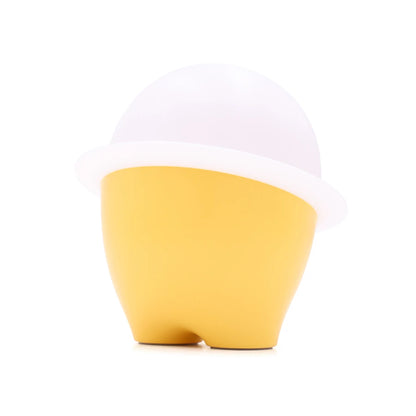 the back of a yellow and white night light