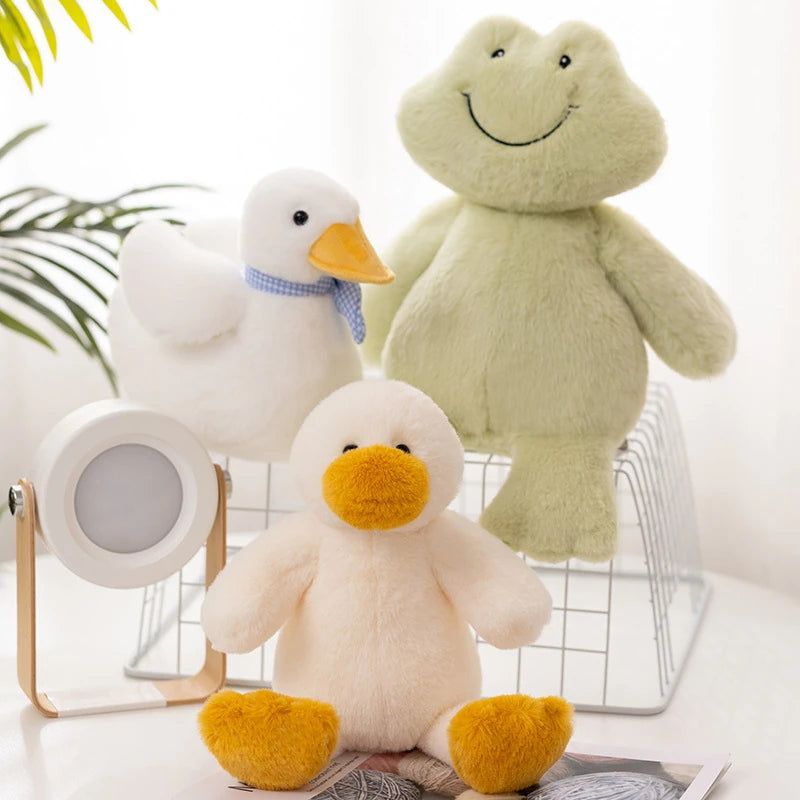 large duck, frog, and goose soft toys