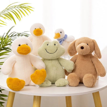 a small goose, and large goose, duck, frog, and brown dog soft toys