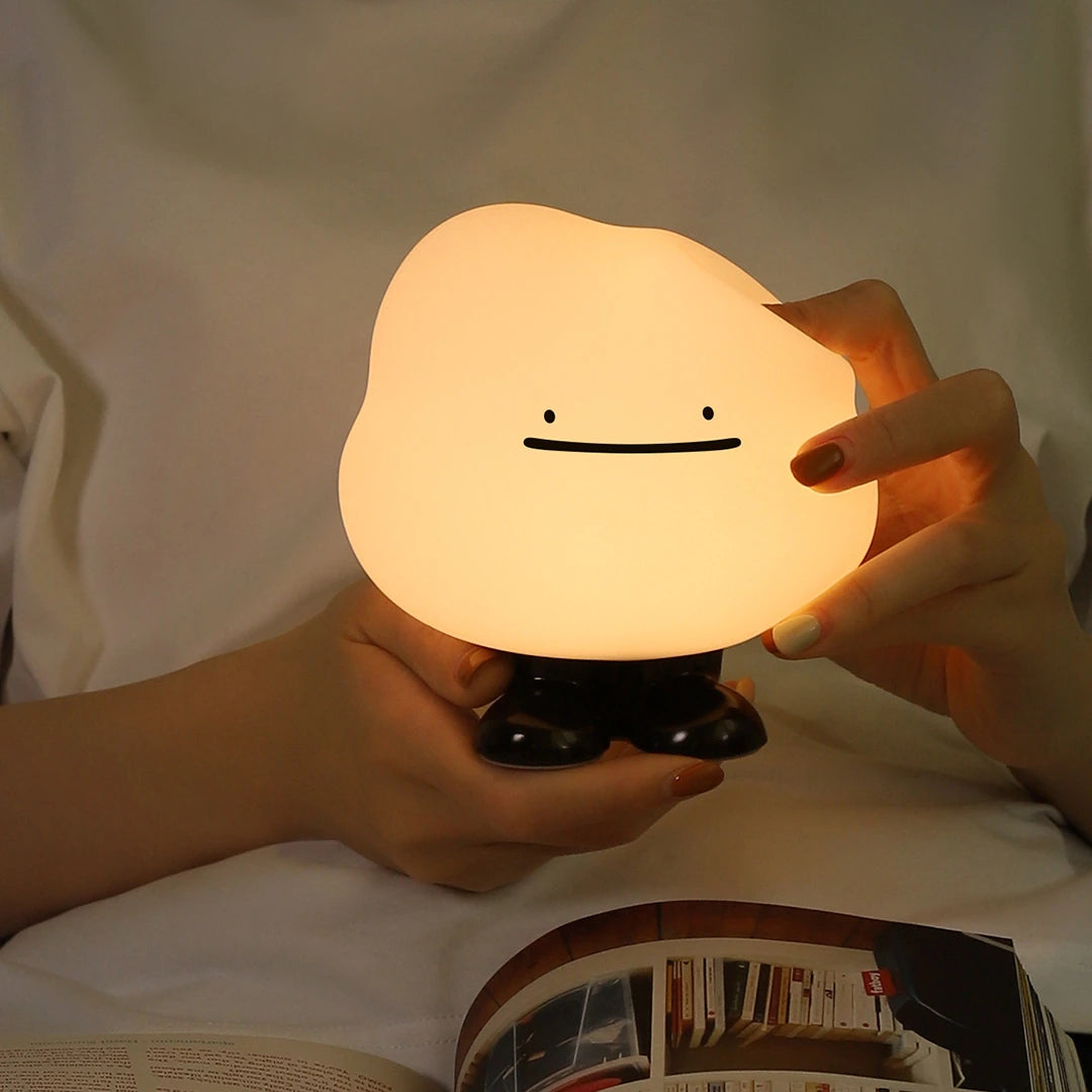 a white silicone cartoon cloud night light