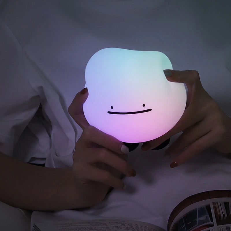 a white silicone cartoon cloud night light