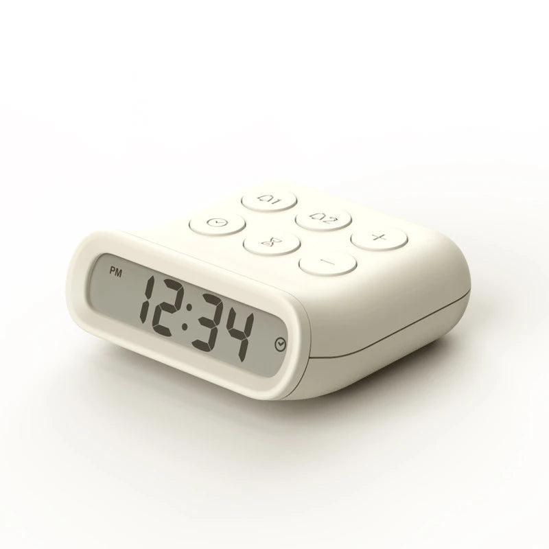 a white minimalist digital alarm clock