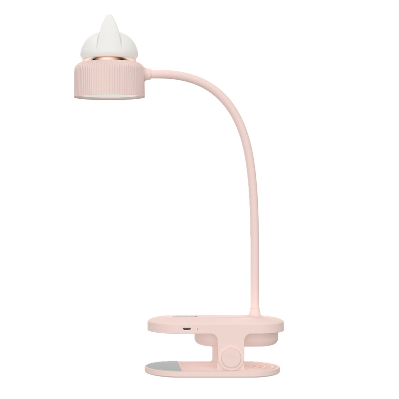 a pink desk lamp with a clip base, bendable neck, directional light and silicone kitten ear night light