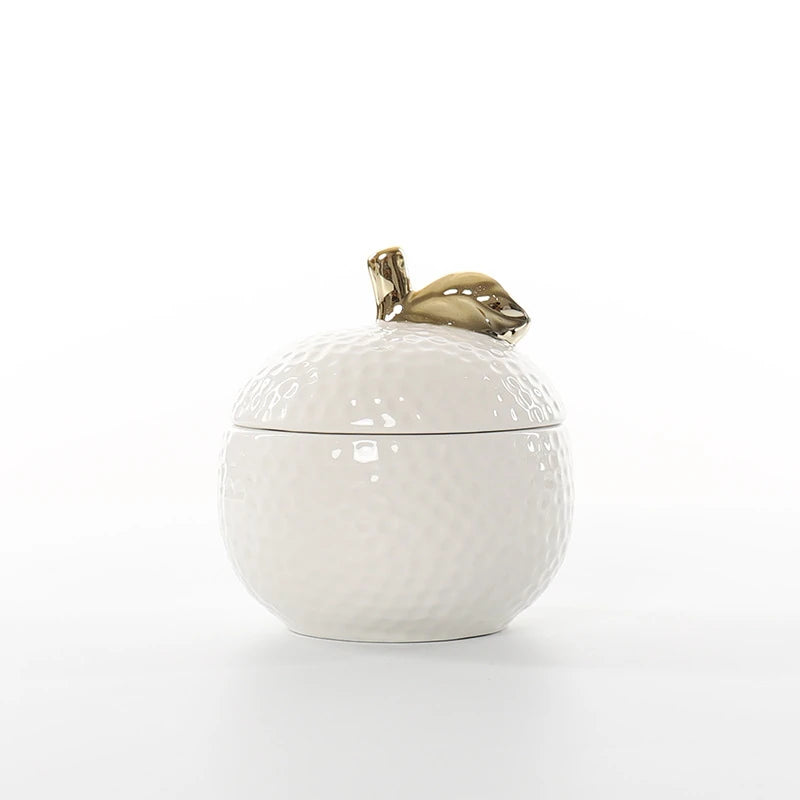 a glossy mottled ceramic apple jar