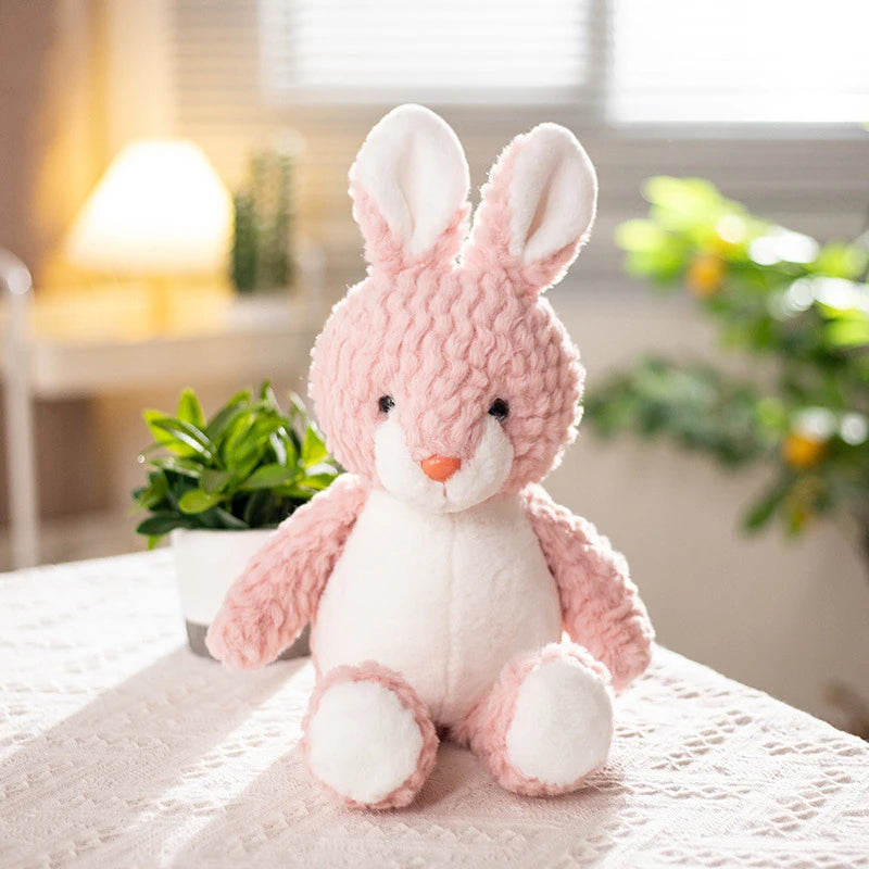 a pink rabbit soft toy