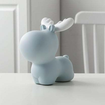 a large blue elk piggy bank