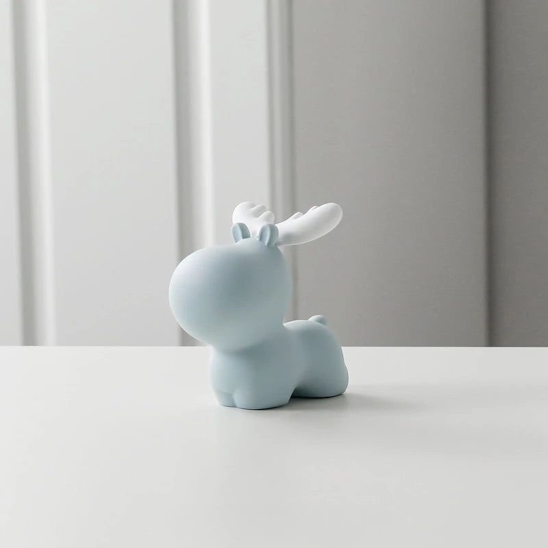 a small blue elk piggy bank