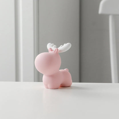 a small pink elk piggy bank