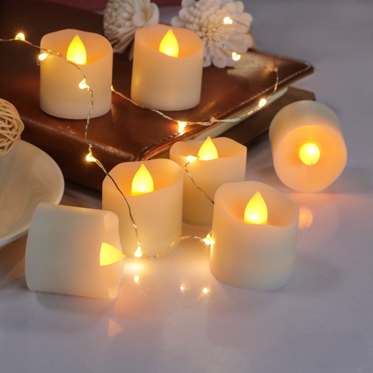 flameless led tea lights shaped as candles with a yellow light