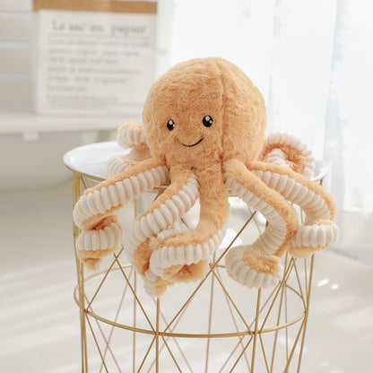 a pastel orange octopus soft toy